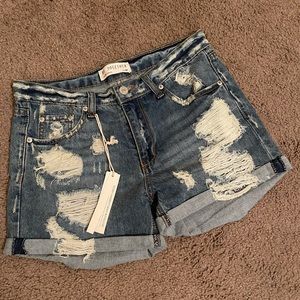 Distressed denim shorts